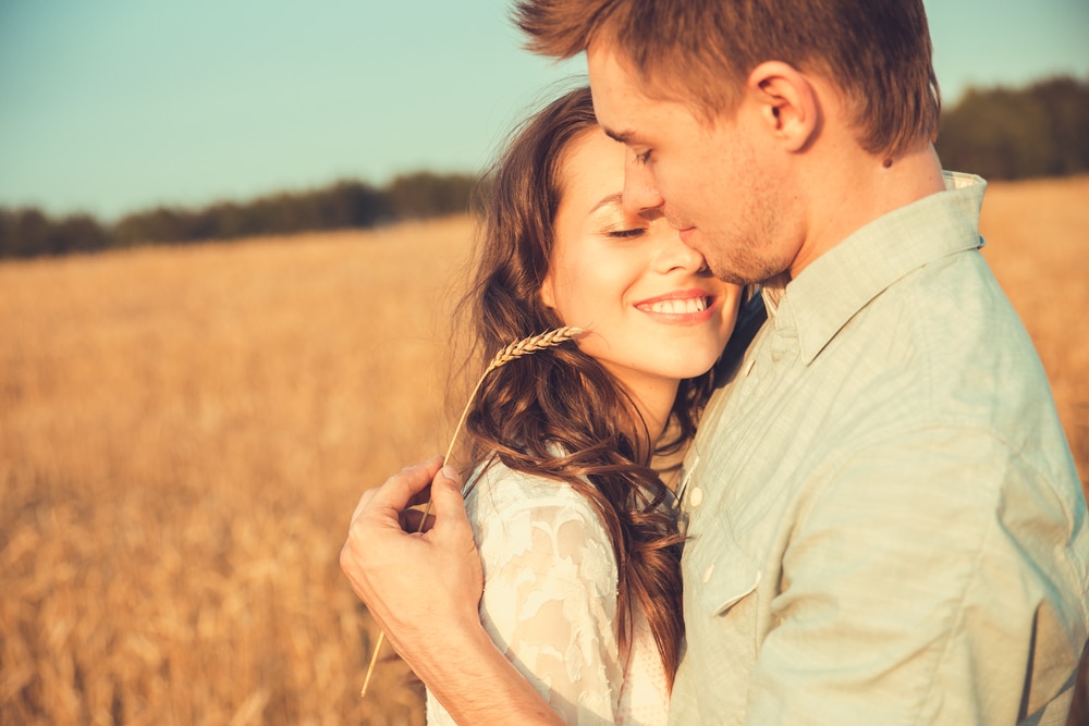 Young couple in love outdoor - The Leo Man with Pisces Rising