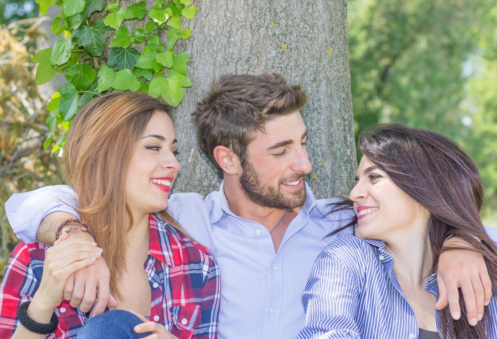 group of friends relaxing in the nature - Leo Man Cheating